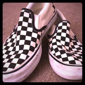 Vans classic black and white checker slips.